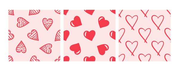 Seamless pattern with red hearts on pink background in doodle style