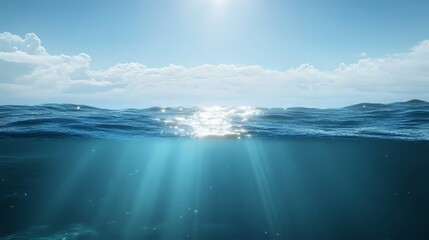 Serene ocean view with shimmering sunlight reflecting on water surface.