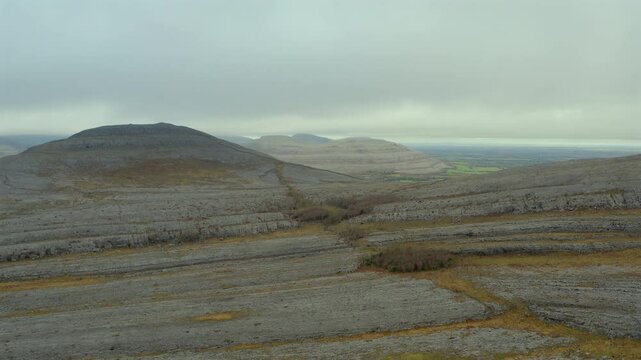 Aerial establishing shot of Burren's Rocky Mountains. County Clare. Ireland