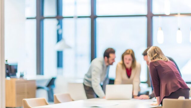 A corporate team brainstorming ideas in a modern office, with the background softly blurred.	
