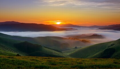 Mist blankets rolling hills, while the rising sun casts golden hues across the serene landscape