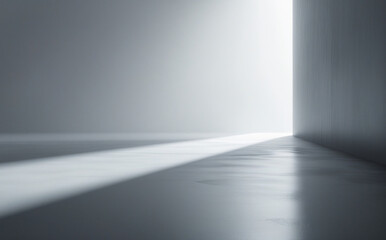 stock photo features a minimalist, clean, and abstract grey gradient background, creating a serene and spacious atmosphere for various design and presentation purposes