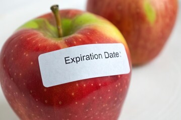 Expiration date label on apple with blank empty space