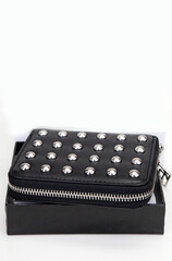 black purse on white background