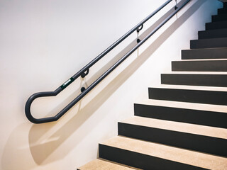 Obraz premium Braille Staircase Handrail Building interior details Universal design for disability 