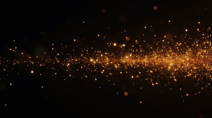Obraz premium Golden glowing sparks on black background