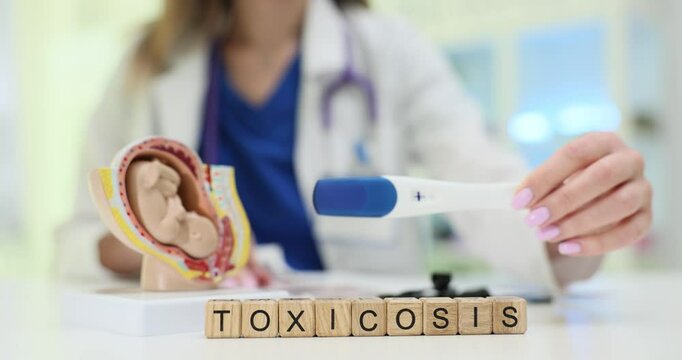 A skilled doctor demonstrates toxicosis effectively using various models and tools to enhance understanding
