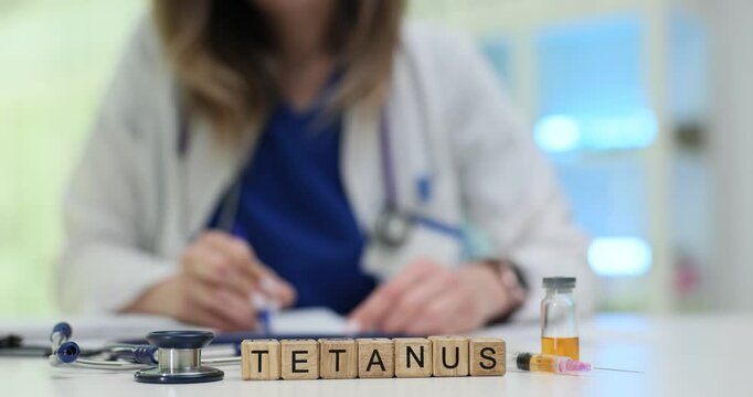 A skilled medical professional is preparing for the tetanus vaccination, using the necessary tools and ampoules