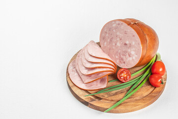 Tasty meat sausages. Turkey Boiled Ham on a wooden board, top view. copy space