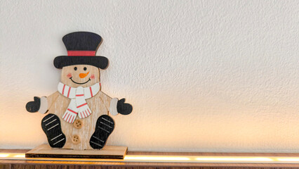 Wooden snowman doll, white background for banner advertising