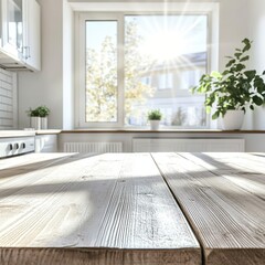 Fototapeta premium Empty wooden table with the bright white interior of the kitchen as a blurred background behind the bokeh golden sunshin