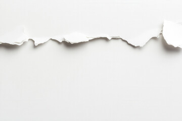 Close-up of a torn white paper creating an artistic irregular texture