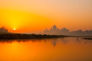 Fototapete Taj Mahal scenic sunset view in Agra, India © CRSHELARE
