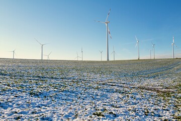 wind turbines in winter at the field