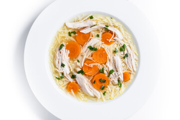 Homemade chicken soup with carrot isolated on white background