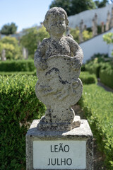 Obraz premium Stone statue depicting the lion sign belonging to the episcopal garden of the city of Castelo Branco-Portugal.