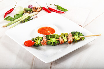 Thai Street foof satay with bacon and broccoli