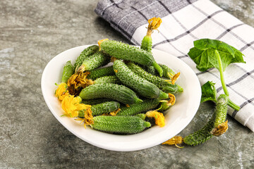 Raw gherkin cucumbers in the bowl