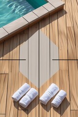 Wooden floor near the pool with natural and warm wood tone. Part of the clean sparkling pool with turquoise water is visible. Several neatly folded white towels are lying on the floor