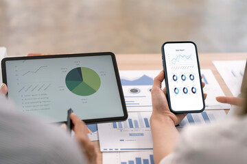 Business people Consulting meeting working and brainstorming new business project, using tablet and mobile phone at desk office.