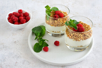 Raspberry Granola Yogurt Parfait white tray close up 