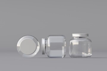Composition arrangement with glass bottles on white background.