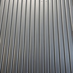 shiny galvanized rib corrugated steel sheet roofing metal plate cladding closeup texture background