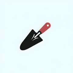 Garden trowel with brown handle isolated on light blue background.