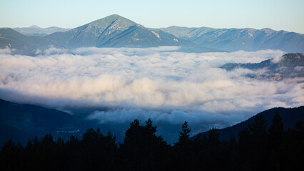Mountain view over the clouds.