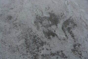 Nature, frozen ice, a thick ice floe of the Dnipro River with white snow.