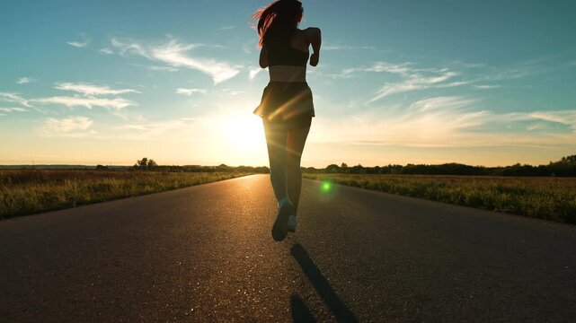 silhouette sports girl running along road sunset, marathon runner sport running. triathlete, jogging dusk, outdoors, asian female runner jogging road, running silhouette, jogging on top at sunset