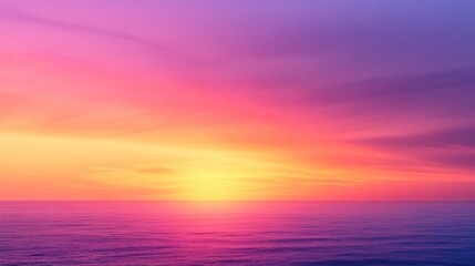 Obraz premium Glorious sunset with pink and purple hues reflecting on the ocean surface.