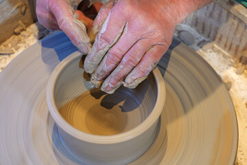Hands Crafting Pottery