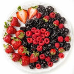 Obraz premium A platter of assorted fresh berries including strawberries, blackberries, and blueberries