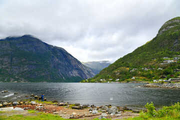 Fototapeta premium The Eidfjord is the easternmost arm of the Hardangerfjord in the Fylke Vestland in Norway. The Eidfjord is a foothill to the east of the city of Bergen.