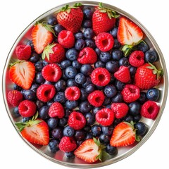 Obraz premium A platter of assorted fresh berries including strawberries, blueberries, and blackberries