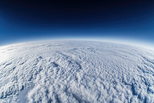 Aerial view of clouds and blue sky from a plane window