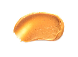 Smooth creamy peanut butter spread on white background for nutty snack lovers.