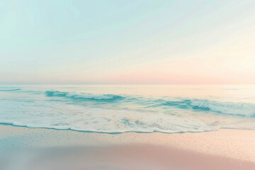 horizontal image of pastel color beautiful sunset at the beach, pale and delicate sky, soft small waves