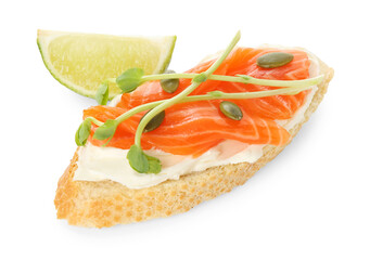 Delicious bruschetta with cream cheese, salmon and piece of lime isolated on white