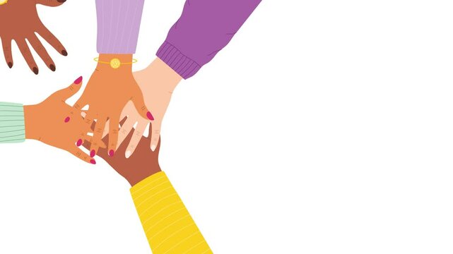 A stack of women's hands of different nationalities. The concept of support, unity, teamwork, sisterhood, cohesion.