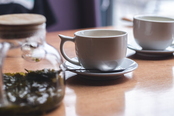 Concept of drinking tea in a cafeteria
