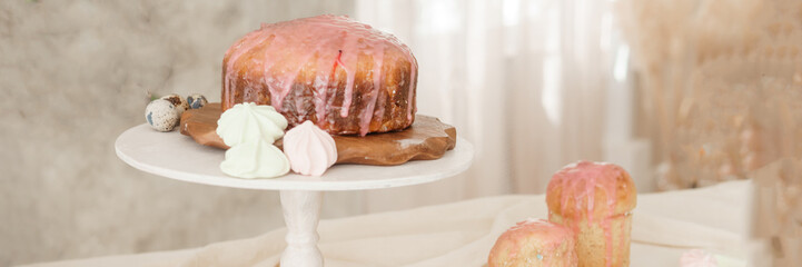 A set table for the celebration of Easter. Cakes and quail eggs on the Easter table.