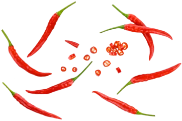 Scattered collection ripe red hot chili peppers Thai and sliced, isolated on a transparent background. Top view.