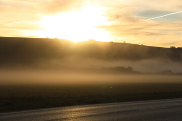 Landscape of Sierra de Albarracin covered by fog at sunset