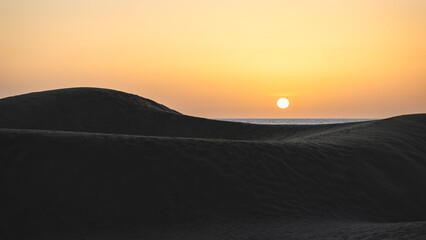 sunrise over the mountains, dunes Maspalomas, Gran Canaria