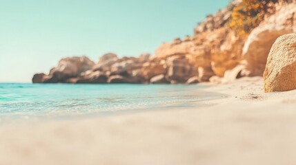 Naklejka premium Tranquil beach with soft waves lapping at the shore under clear skies