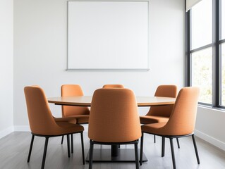 Empty round table and orange chairs in a bright meeting room promoting open communication