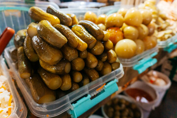 sale of pickled vegetables on the market in Kazakhstan. preservation of vegetables with marinade