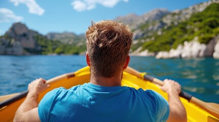 Man rows a boat across tranquil waters surrounded by stunning cliffs